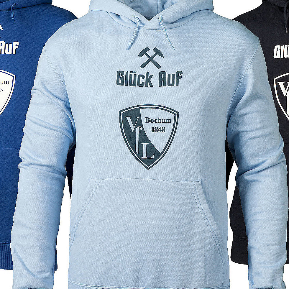 Thumbnail VfL-Bochum-Hoodies mit „Glück Auf"-Schriftzug, Bergmannssymbol und Vereinswappen in den Farben Blau, Hellblau und Schwarz, an Kleiderpuppen präsentiert.